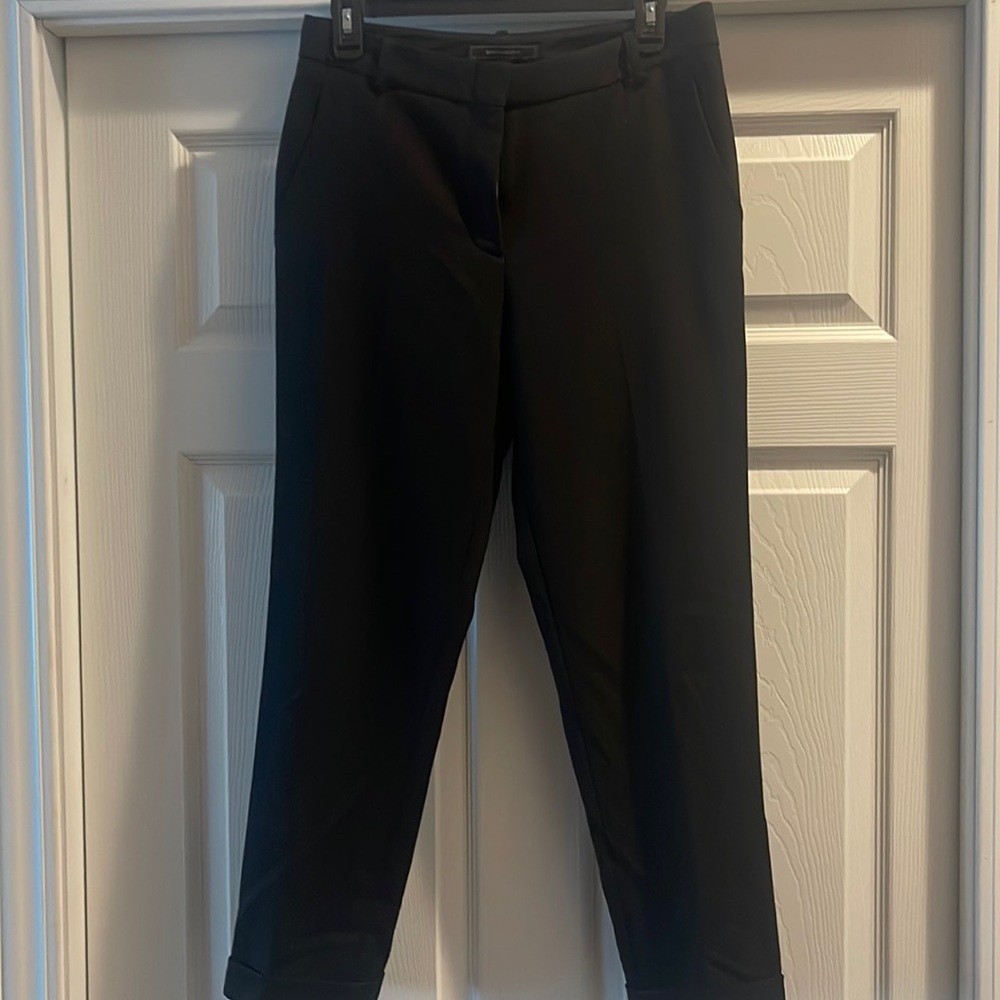 A black cuffed ankle pant